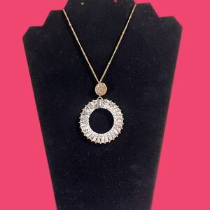 Gold Necklace With White Decorative Pleated Circle Pendant